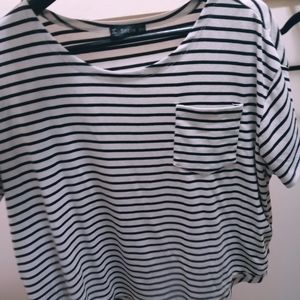 White top with black stripes